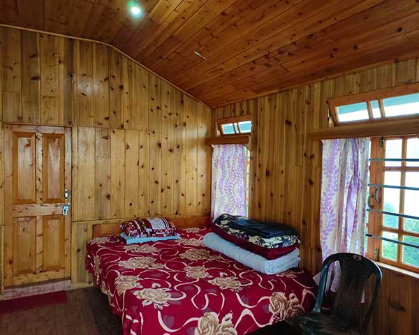 Double bed room at khinanam kabiraj homestay at dawaipani