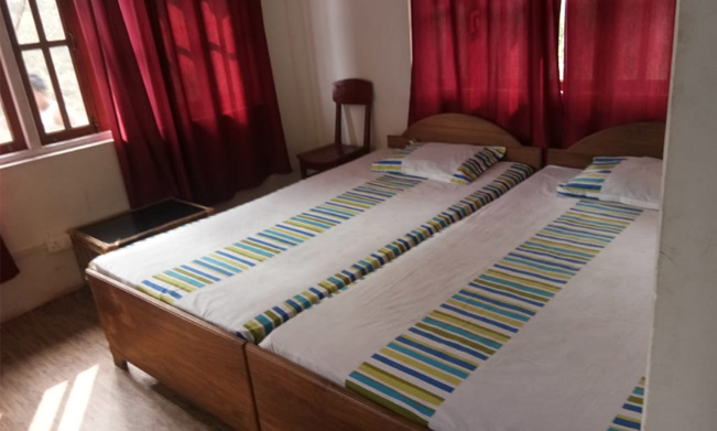 Namrata homestay nice double bed room image at rocky island near sumsing