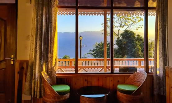 Chisang The Wildwoods Homestay Deluxe bed room window view mountain view hill view