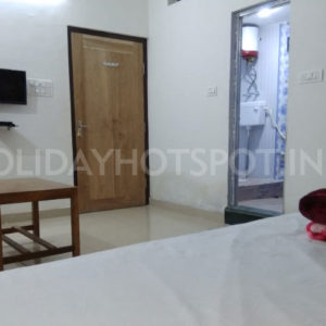 Babusona Homestay deluxe double beded bedroom at Jaldapara