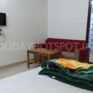 Babusona Homestay deluxe double beded bedroom at Jaldapara