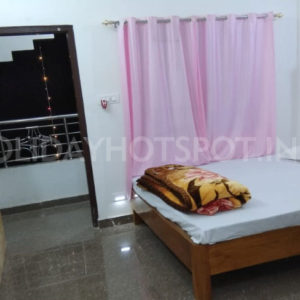 Babusona Homestay deluxe double beded bedroom at Jaldapara