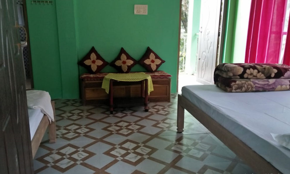 Humro Homestay Suntalekhola best deluxe bed room including attached bathroom and mirror