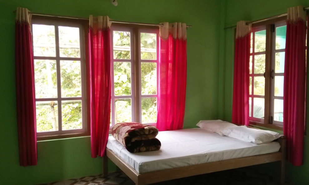 Humro Homestay Suntalekhola best bed room including attached bathroom and mirror