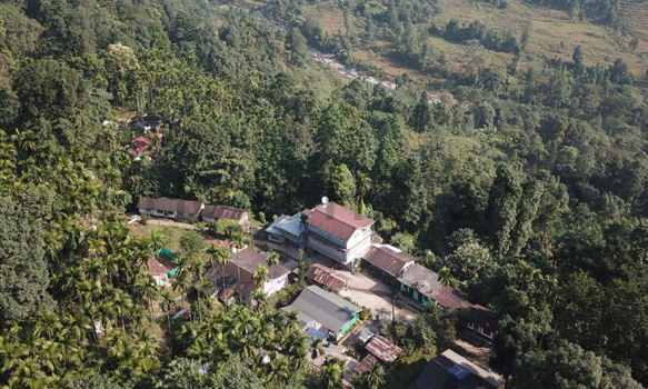 Trishna Homestay long view beside the river murti
