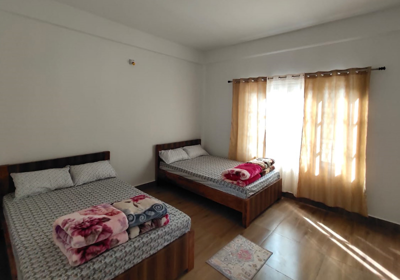 Triple bed room image at todey tangta
